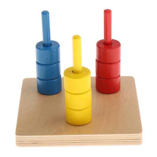Montessori Colour Discs On Three Vertical Dowels